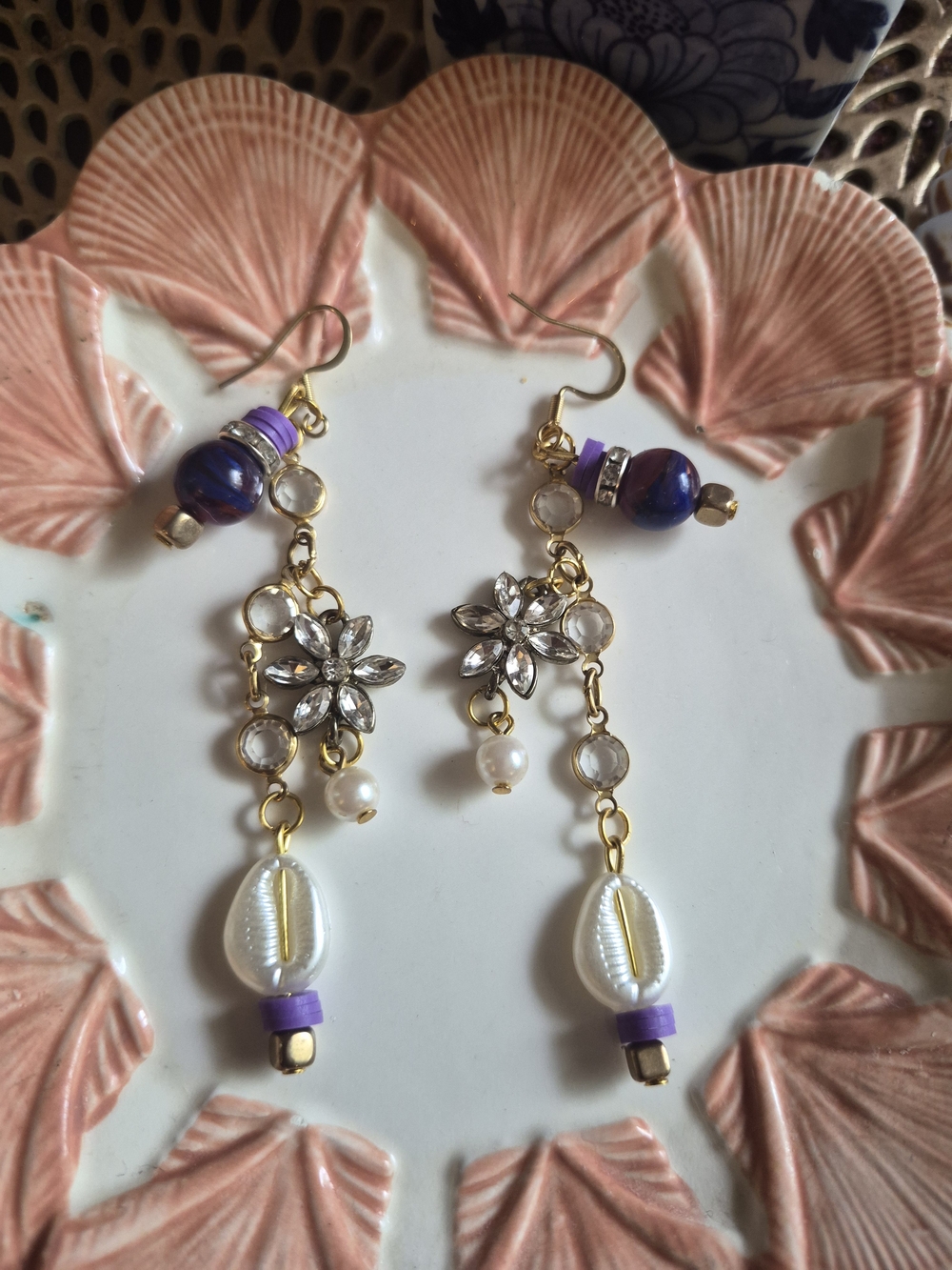 Gold Floral Drop Earrings with Purple Beads and White Shell Charms